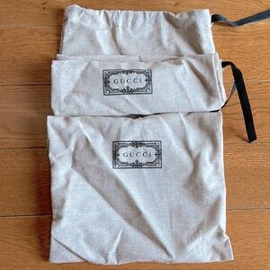 Gucci 2 dust bags.